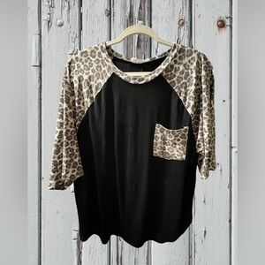 Zenana 3/4 sleeve black top w/ leopard sleeves & leopard pocket. Size XL